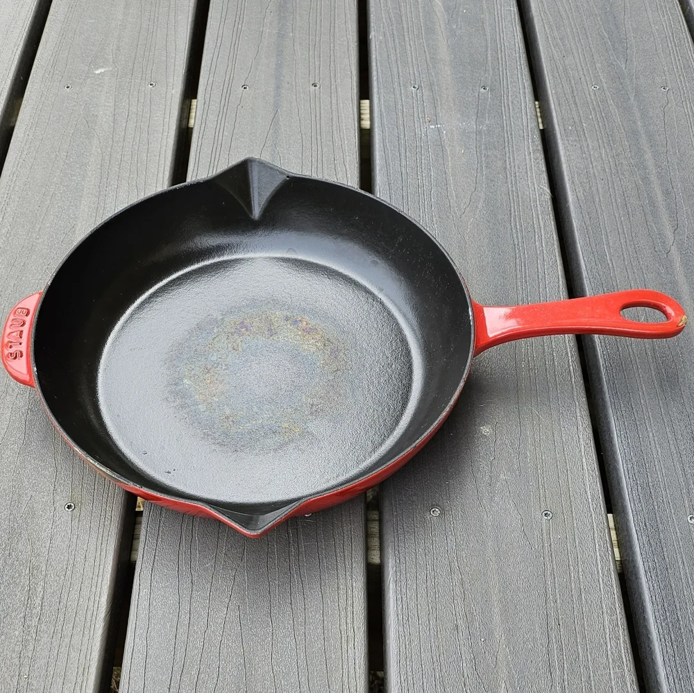Used once Staub classic cast iron fry pan in cherry red